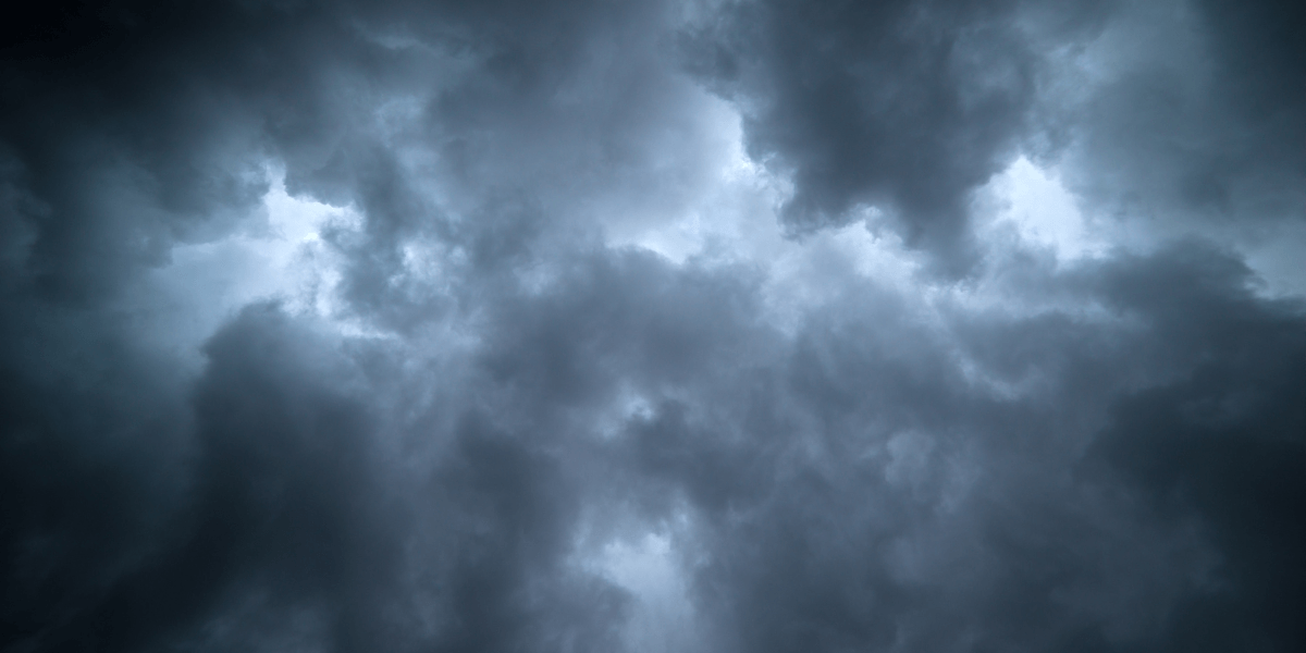 weathering and racial oppression reflected in stormy clouds