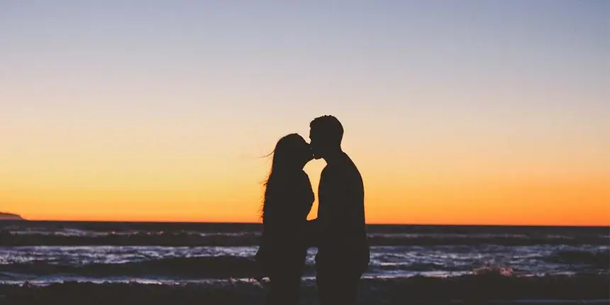 A couple affectionately kissing each other