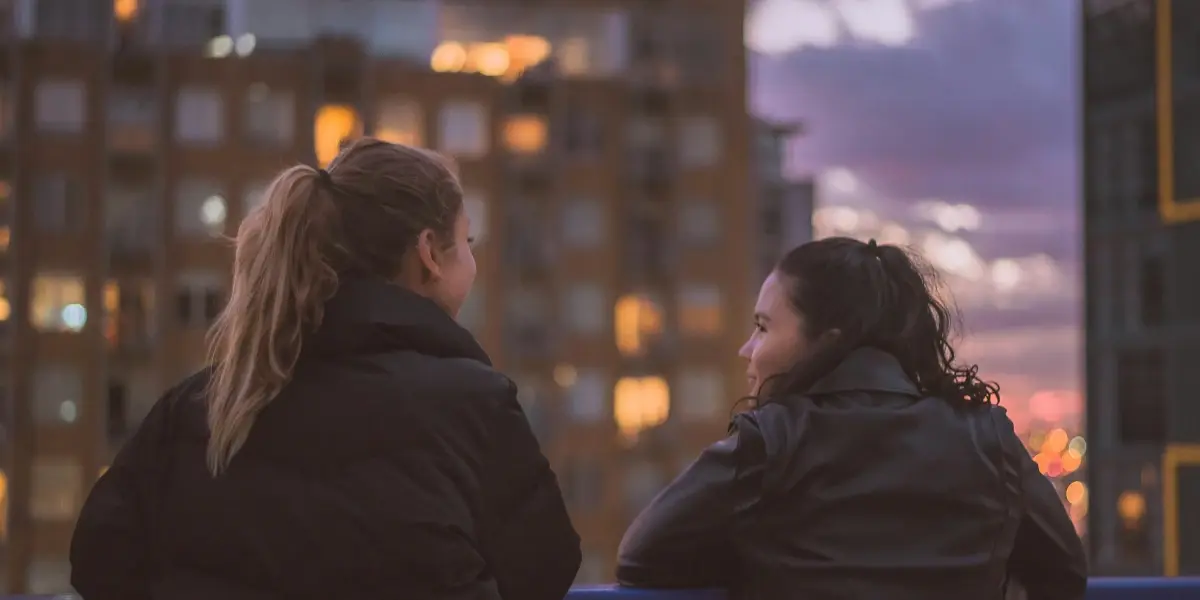 2 women staring at one another