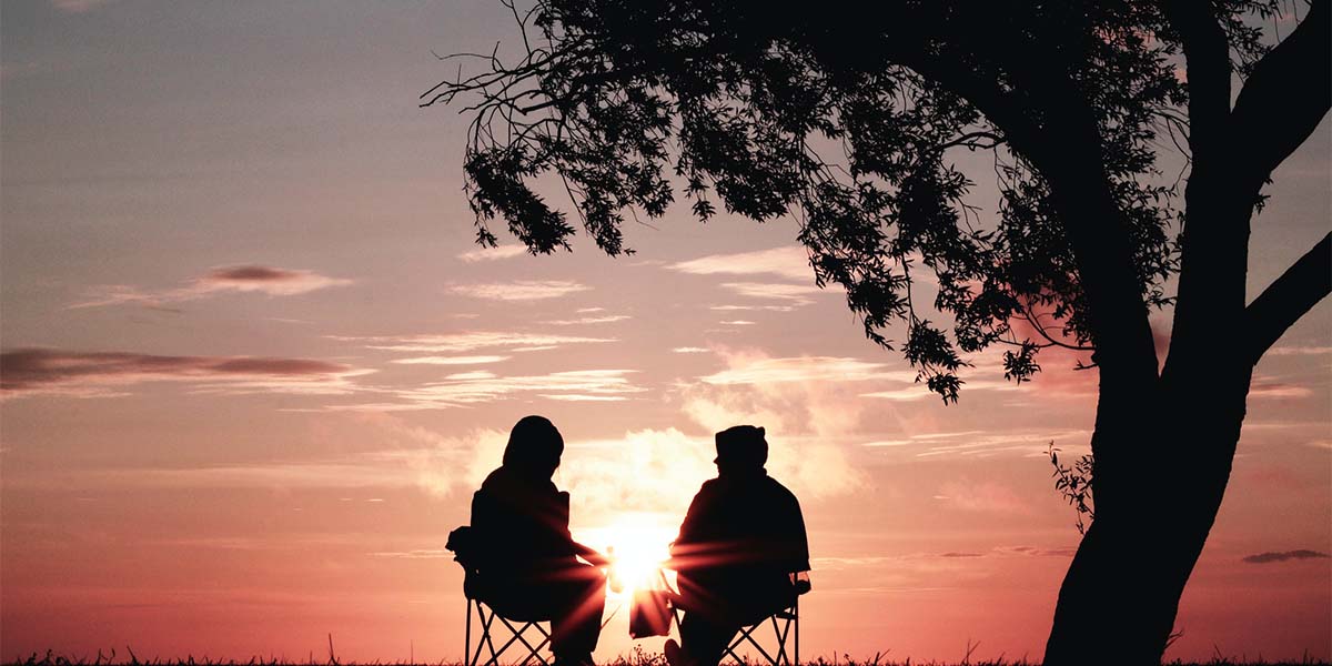 Two people talking.
